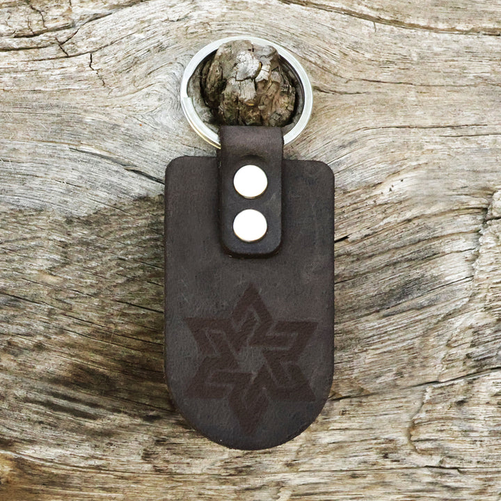 Brass and Black Leather Keychain with Star Sign - Night Star | NOVICA