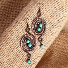 Load image into Gallery viewer, Antiqued Finished Spiral Copper Dangle Earrings from Armenia - Swirls of Eden | NOVICA
