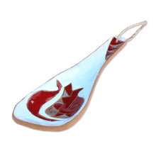 Load image into Gallery viewer, Pomegranate-Themed Painted Blue Ceramic Spoon Rest - Romance Flavors in Blue | NOVICA
