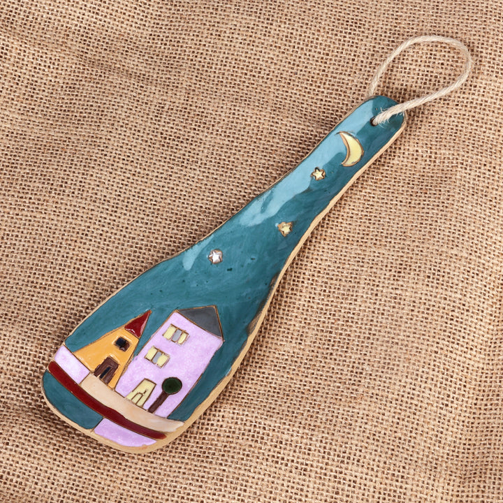 Handcrafted Teal Ceramic Spoon Rest in a Glazed Finish - Teal Metropolis | NOVICA
