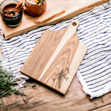 Load image into Gallery viewer, Handcrafted Laurel Wood Cutting Board with Macaw Engraving - Macaw's Delicacies | NOVICA
