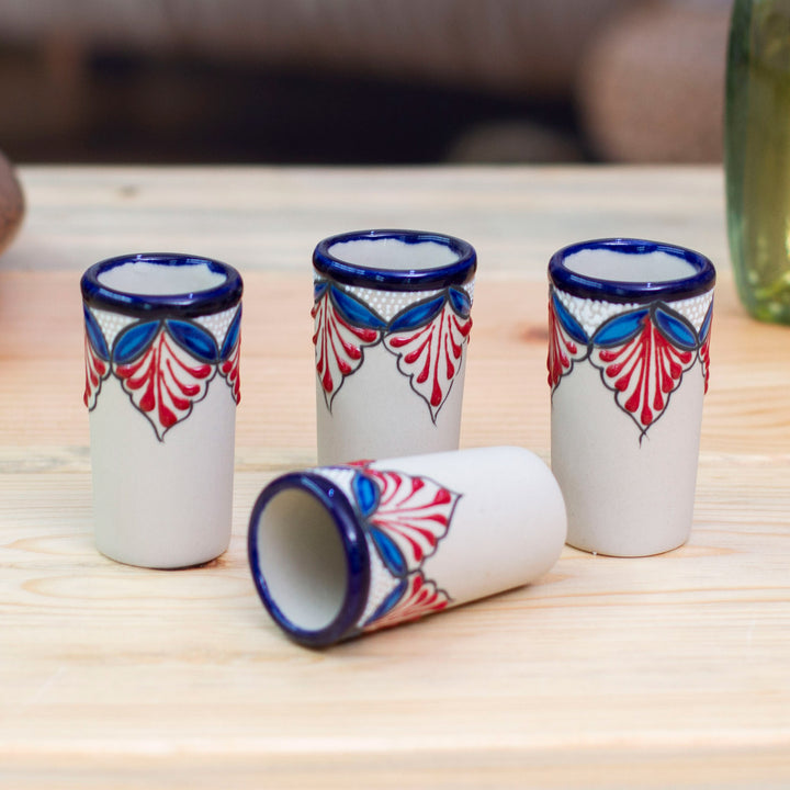 Set of 4 Handmade Talavera-Style Blue and Red Tequila Cups - Hidalgo Flourish | NOVICA
