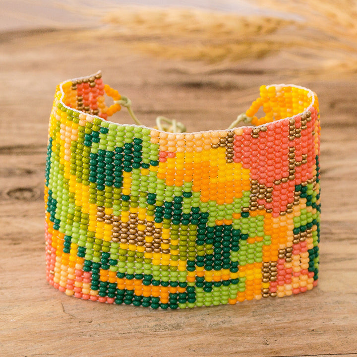 Adjustable Orange and Green Glass Beaded Wristband Bracelet - Tropical Winds | NOVICA