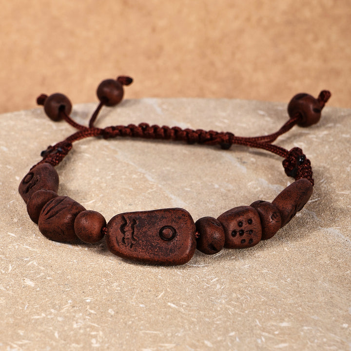 Hand-Painted Brown Ceramic Beaded Macrame Pendant Bracelet - Bewitching Brown | NOVICA