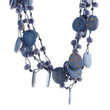 Load image into Gallery viewer, Hand-Carved Beaded Statement Necklace in Blue and Gold Hues - Bohemian Joy in Blue | NOVICA
