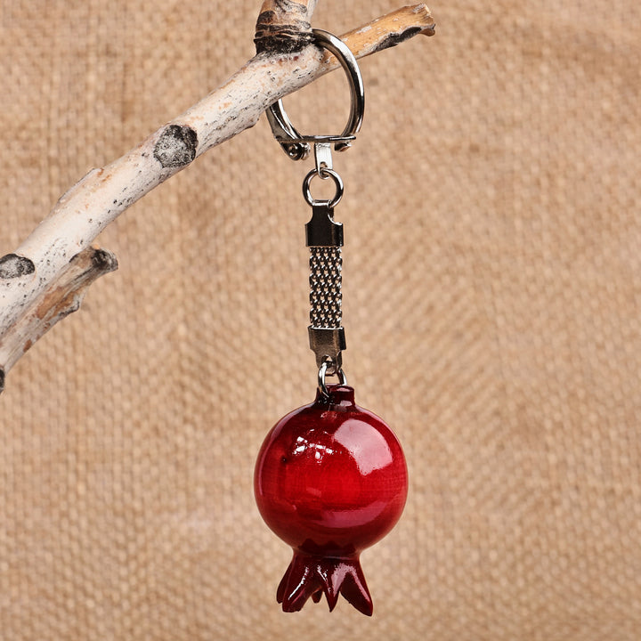 Pomegranate-Shaped Red Wood and Stainless Steel Keychain - Romantic Luck | NOVICA