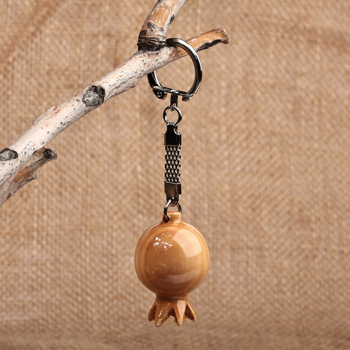 Pomegranate-Shaped Brown Wood and Stainless Steel Keychain - Pomegranate Luck | NOVICA