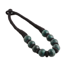 Load image into Gallery viewer, Bohemian Teal Black Wood Beaded Necklace with Cotton Cord - Boho Bubbles in Teal | NOVICA

