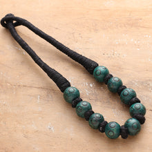 Load image into Gallery viewer, Bohemian Teal Black Wood Beaded Necklace with Cotton Cord - Boho Bubbles in Teal | NOVICA
