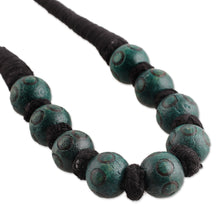 Load image into Gallery viewer, Bohemian Teal Black Wood Beaded Necklace with Cotton Cord - Boho Bubbles in Teal | NOVICA
