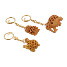 Load image into Gallery viewer, Set of 3 Animal-Themed Kadam Wood Jali Keychains from India - Jali Friends | NOVICA
