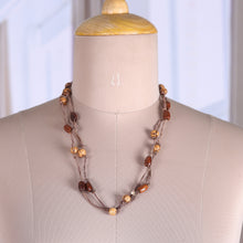 Load image into Gallery viewer, Artisan-Made Bohemian Haldu Wood Beaded Station Necklace - Earth Grandeur | NOVICA
