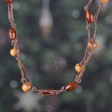 Load image into Gallery viewer, Artisan-Made Bohemian Haldu Wood Beaded Station Necklace - Earth Grandeur | NOVICA
