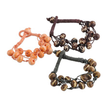 Load image into Gallery viewer, Indian-Made 3-Piece Brown and Orange Beaded Bracelet Set - Boho Earth | NOVICA

