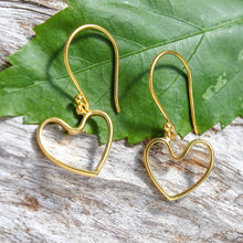 Load image into Gallery viewer, 18k Gold-Plated Heart-Shaped Dangle Earrings Made in Bali - Swinging with Love | NOVICA
