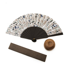Load image into Gallery viewer, Batik Floral and Leaf-Themed Silk Fan with Pinewood Handle - Nocturnal Garden | NOVICA
