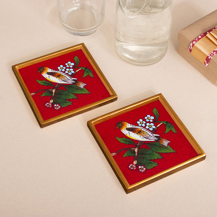 Red and Golden Reverse-Painted Glass Spring Coaster Pair - Passionate Songbird | NOVICA