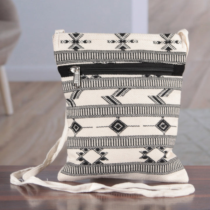 Folk Art-Patterned Ivory and Onyx Cotton Zippered Sling Bag - Ivory Medley | NOVICA