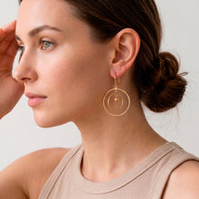 Load image into Gallery viewer, Concentric Circle Swinging Orb-Themed Gold-Plated Earrings - Swaying Sphere | NOVICA
