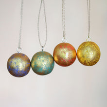 Load image into Gallery viewer, Four Round Gold Tone Albesia Wood Ornaments from Bali - Golden Baubles | NOVICA
