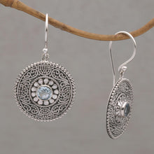 Load image into Gallery viewer, Blue Topaz and 925 Silver Circular Dangle Earrings from Bali - Mystic Shields | NOVICA
