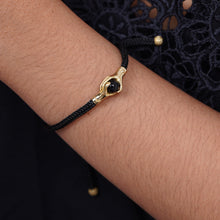 Load image into Gallery viewer, Brass and Black Obsidian Cord Unity Bracelet from Bali - Golden Handshake | NOVICA
